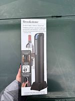 Front of boxed Brookstone Automatic Wine Opener set