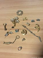 Full layout of all jewellery pieces on wood surface