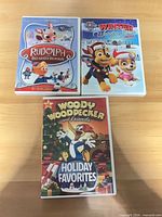 Front view of the three holiday DVD cases