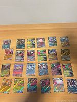 All 25 Japanese Pokémon holographic cards laid out in five rows