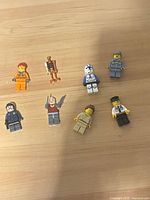 All eight Lego minifigures displayed