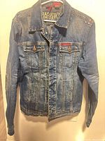 Front view of Parasuco Denim Cult denim jacket hanging, showing overall condition and design