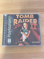 Front of jewel case showing Tomb Raider II cover