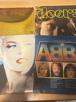 Group shot of four record covers