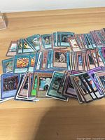 Spread of mixed Yu-Gi-Oh! cards showing quantity and variety
