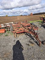 Overall view of International Harvester disc harrow showing frame, disc gangs, wheels, and hitch