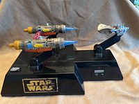 Full view of Star Wars Anakin Skywalker podracer alarm clock showing base, mounted engine pods and cockpit