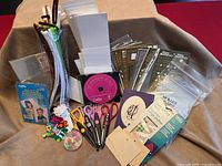 Full lot view showing craft supplies spread on cloth backdrop