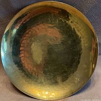 Top view of hammered brass dish