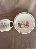 Bowl and cup side by side showing scale and decoration