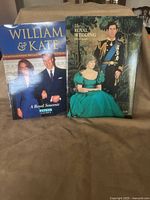 Front covers of both royal souvenir books