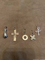 All five sterling pieces lined up