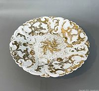 Front view of entire Meissen plate showing design and gilding