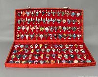 open case showing full set of miniature warriors
