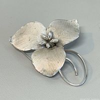 Front view of sterling silver flower brooch