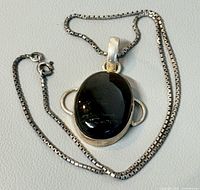 Full view of sterling necklace with onyx pendant