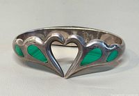 Front view showing heart opening and malachite inlay