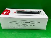 Retail box side panel showing Monami brand, model FX Zeta/1B, quantity 12, made in Korea with one pen on top