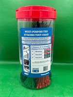 Front of clear jar showing Multi-Purpose Ties label and contents