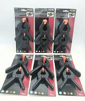 Six sealed packs of clamps front view