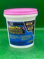 Front of 453 g DAP WoodPro-X tub