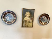 Overall view of three wall art pieces hung together