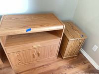 Both nightstands showing size difference and front storage features