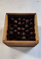 Top view of punches in wooden holder
