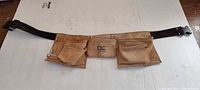Full view of CLC suede tool belt laid flat