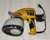 Left side view of Wagner Power Painter Plus showing paint cup and cord