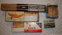 All items overview showing match boxes, jar and boxed toothpicks