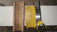 backsaw, yellow plastic miter box, wooden miter box overview
