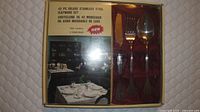 Boxed 42-piece stainless steel flatware set front view