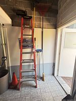 Front view of Featherlite fiberglass step ladder leaned against wall