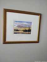 Framed painting on wall, full view