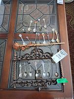 Overall view of spoons and rack on table