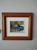 full view of framed painting on wall