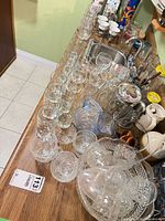 Countertop view showing assorted glassware counts