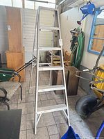Full view of aluminum A-frame step ladder