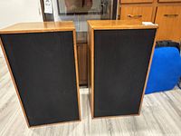Front view of both Martin speakers with black grilles