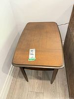 Top view of end table showing wood grain and wear