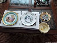 Group shot of all plates and bowl on table
