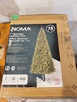 Box top showing NOMA Marcelle 7 ft lighted tree details