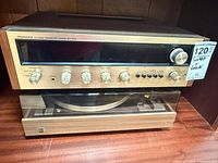 Pioneer SX-525 receiver stacked above Dual 601 turntable