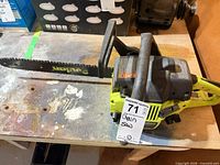 Full view of Poulan 2150 chainsaw on workbench