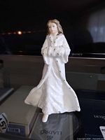 Front view of Royal Doulton Christmas Day figurine