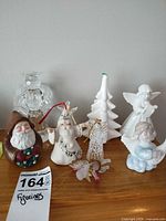 Group shot of all seven figurines on tabletop
