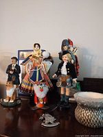 Group shot of all Scottish figurines on tabletop