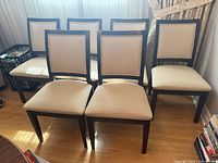 Front view of six matching dining chairs