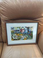 Full view of framed print on sofa